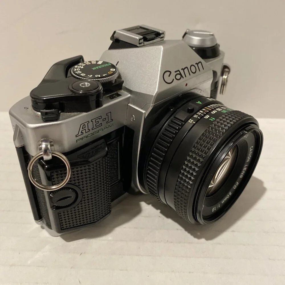 Canon Silver and Black Film Camera Kit with Lenses and Flash